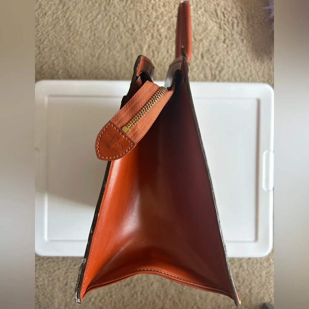 Authentic Louis Vuitton Brown Epi Leather Riviera Handbag
